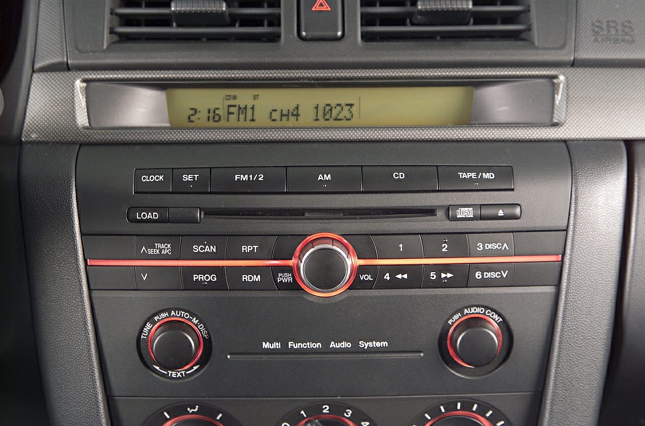 Car audio system and climate controls with radio, CD, and tape options