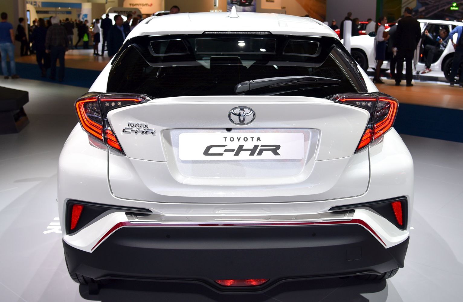 Rear view of hatchback with angular tail lights and spoiler