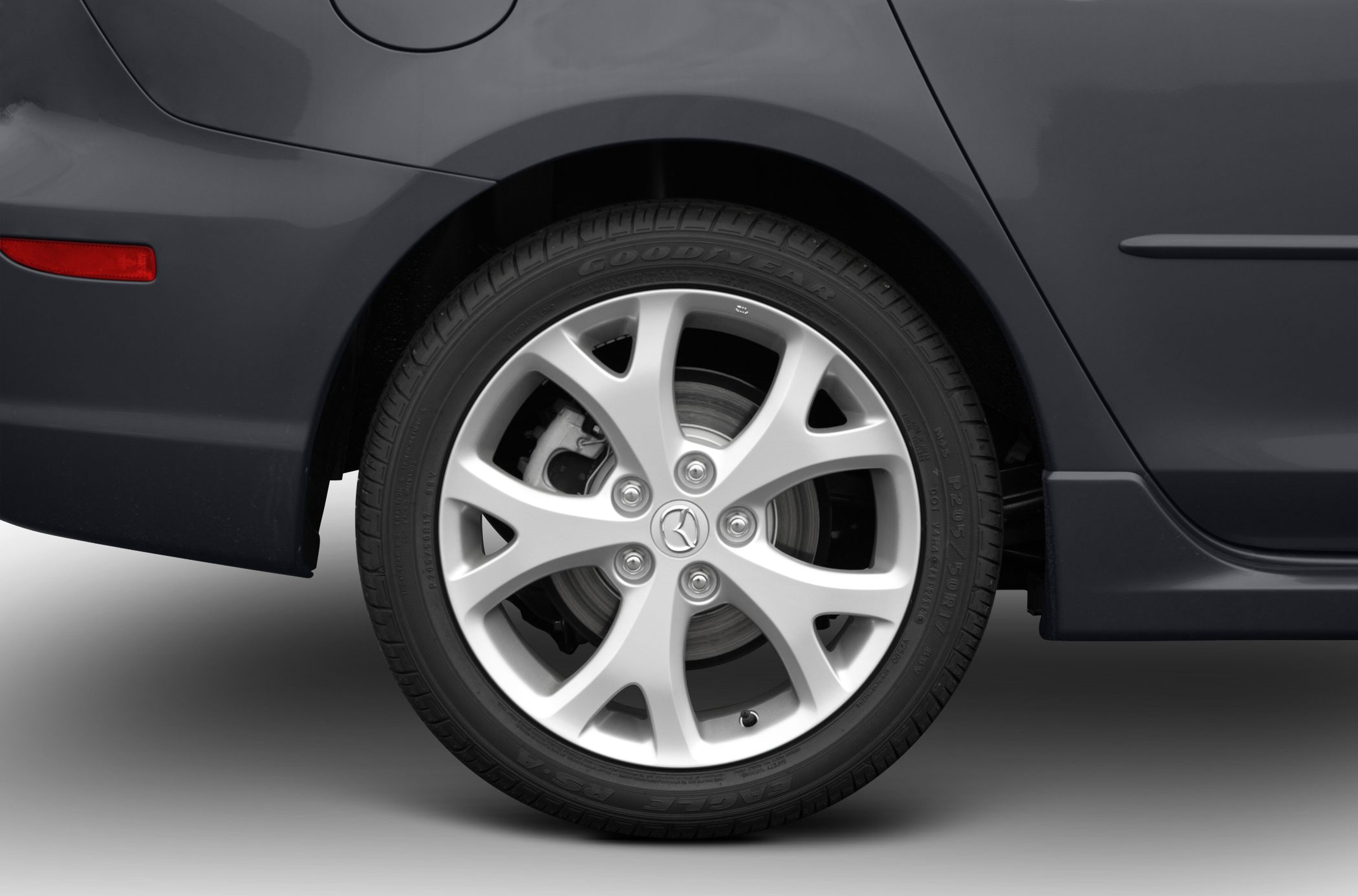 Rear alloy wheel with disc brake and tire close-up