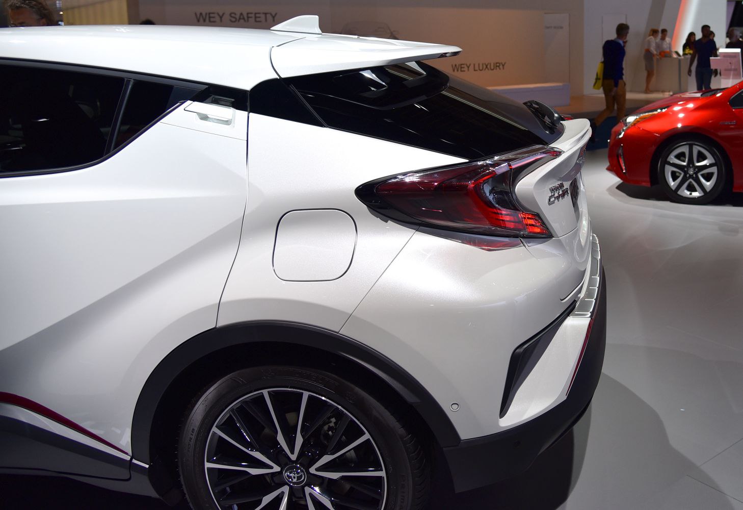 Rear side with angular lines, tail light, fuel door, and wheel detail