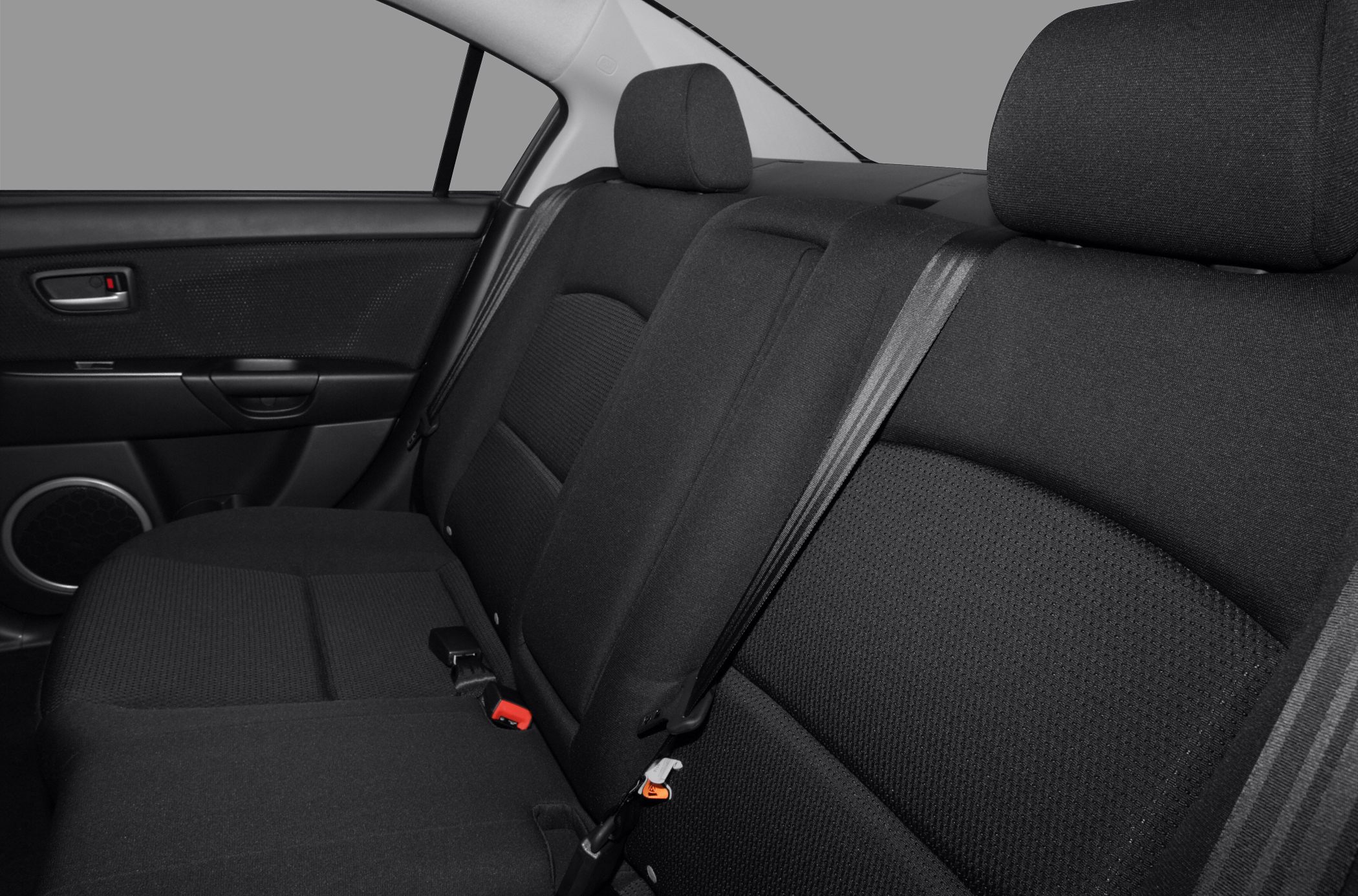 Rear passenger seat with fabric upholstery and seat belts
