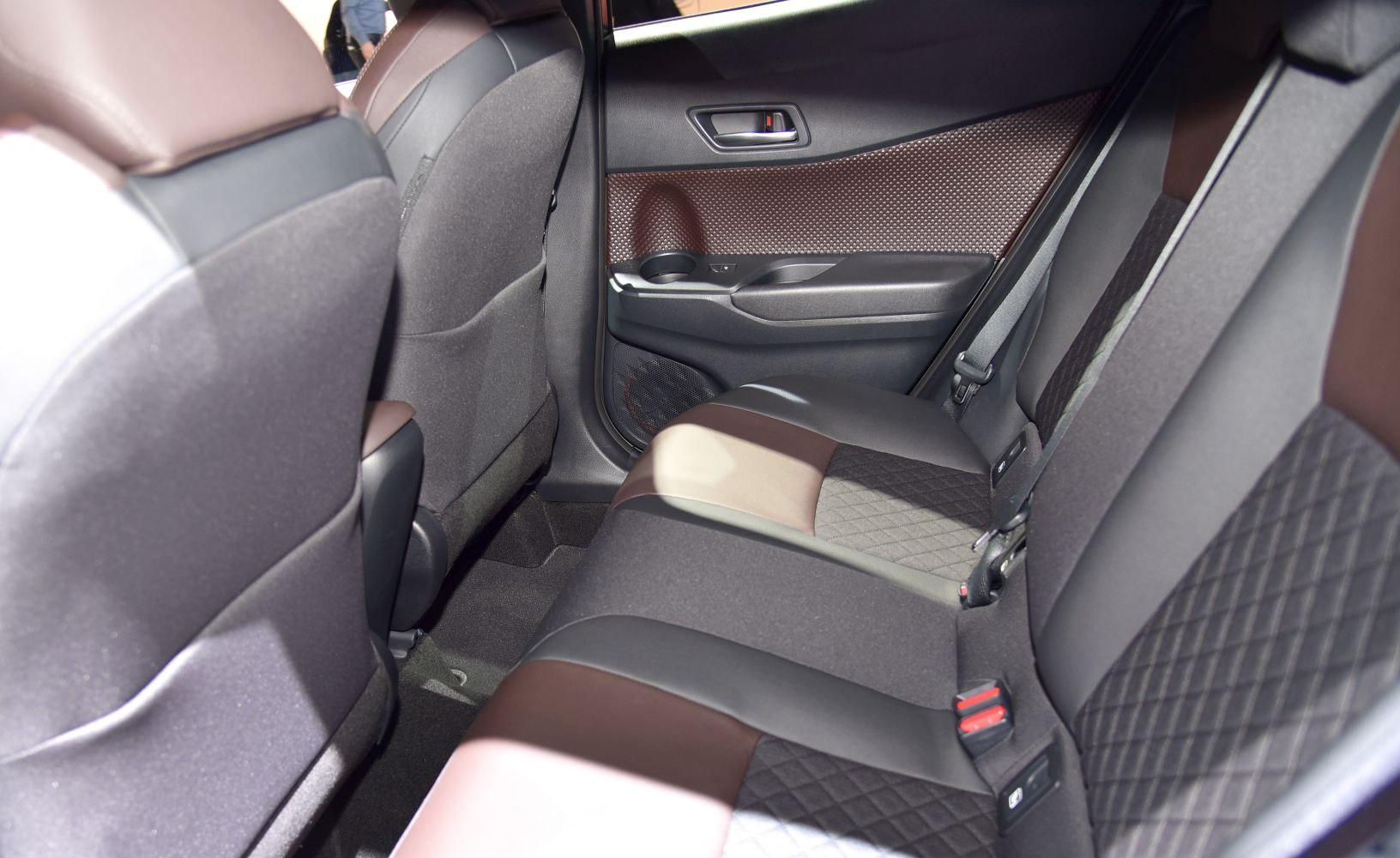 Two-tone rear seats with quilted upholstery and textured door panel