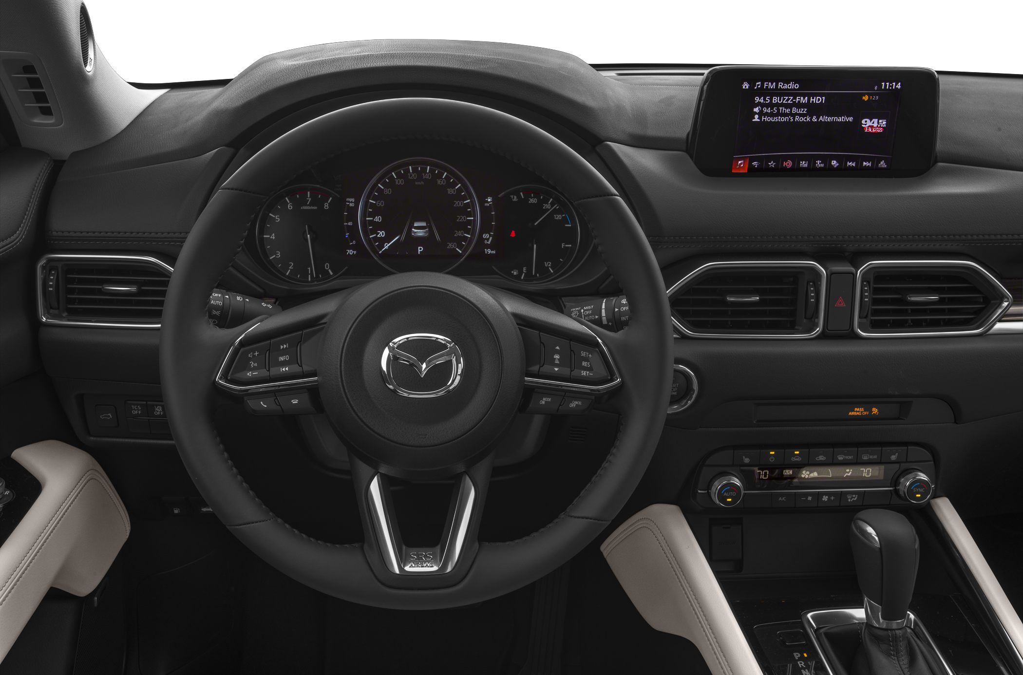 Steering wheel, instrument cluster, infotainment display, and dashboard controls
