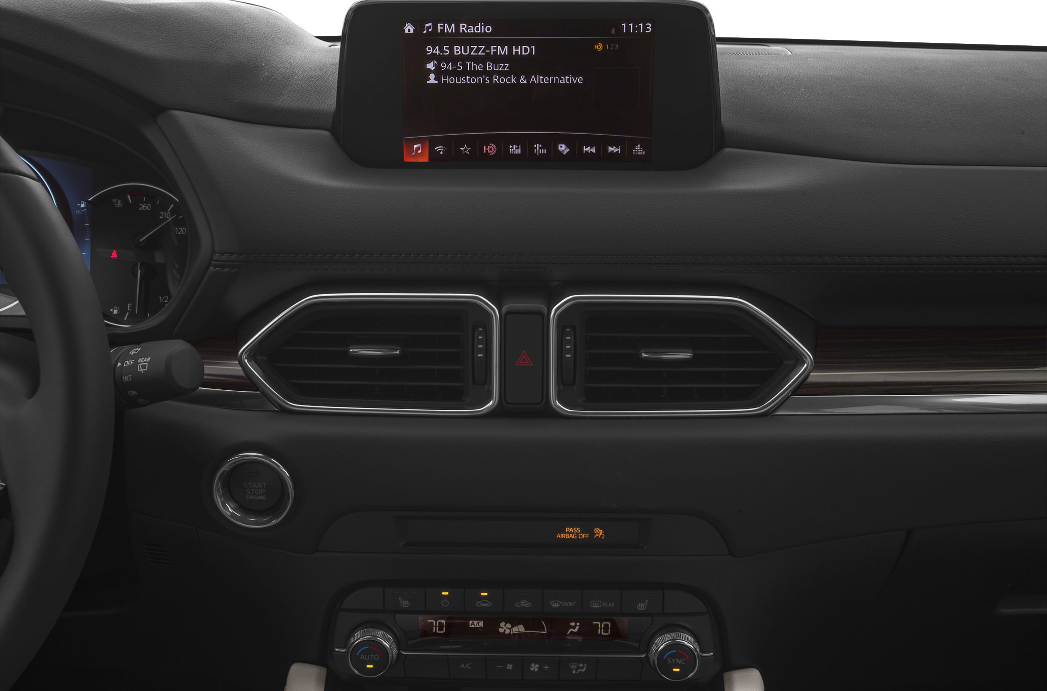 Dashboard with infotainment screen, dual air vents, and climate controls