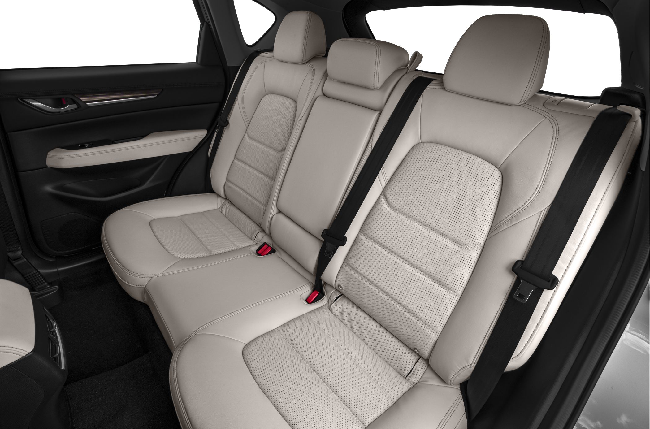 Beige leather rear seats with seat belts and armrest