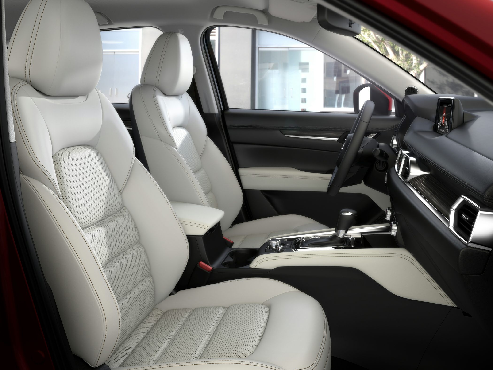 White leather seats and advanced dashboard layout