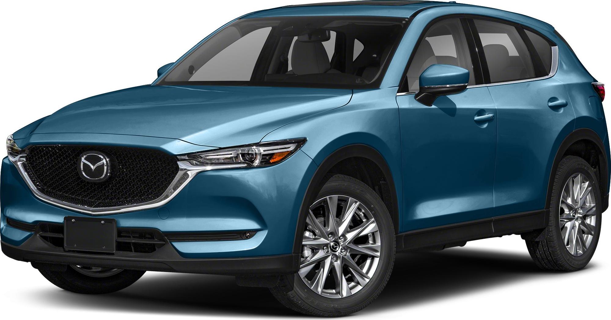Front-left view of blue SUV with sleek headlight and grille.