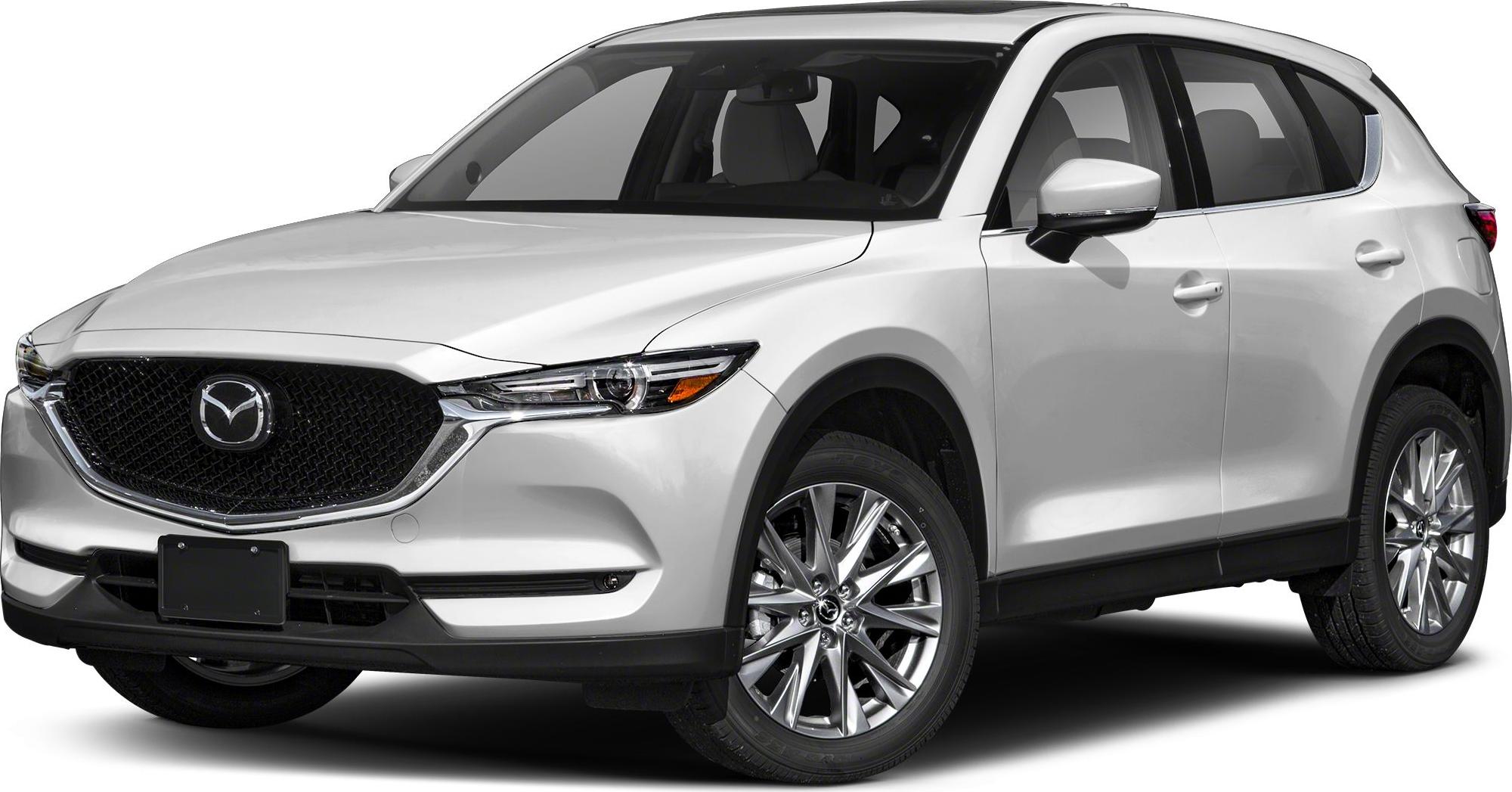 Front and side angle showing grille and alloy wheels