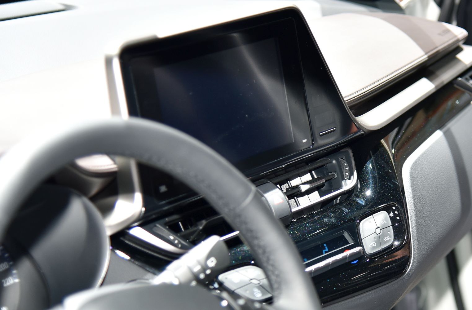 Dashboard with touchscreen and climate controls