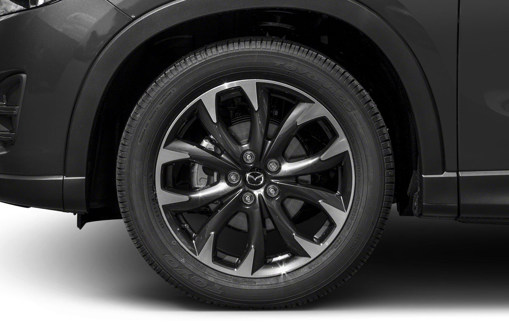 Close-up of alloy wheel and tire on a car's front wheel arch
