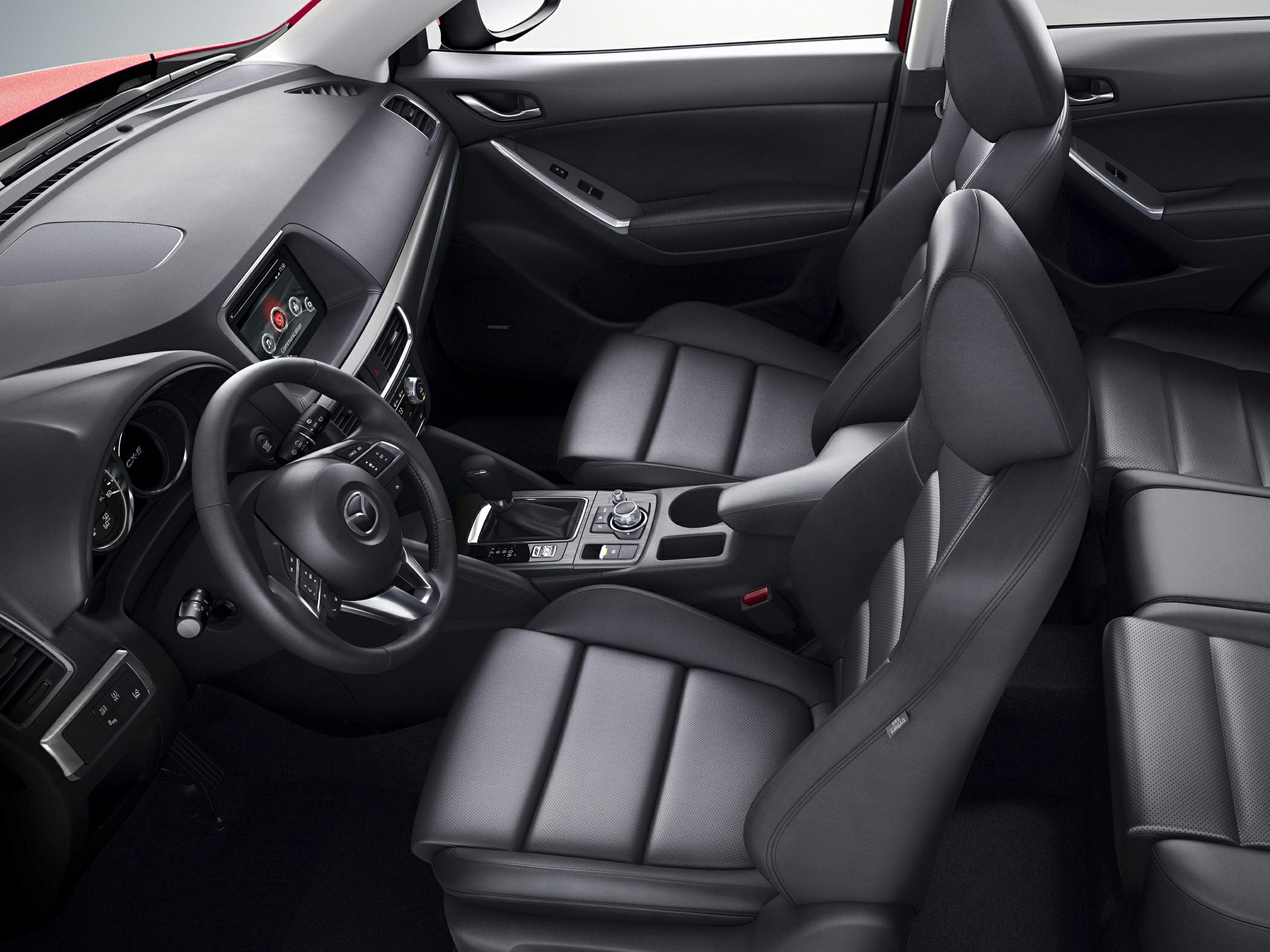 Modern car interior with dashboard, seats, and infotainment system