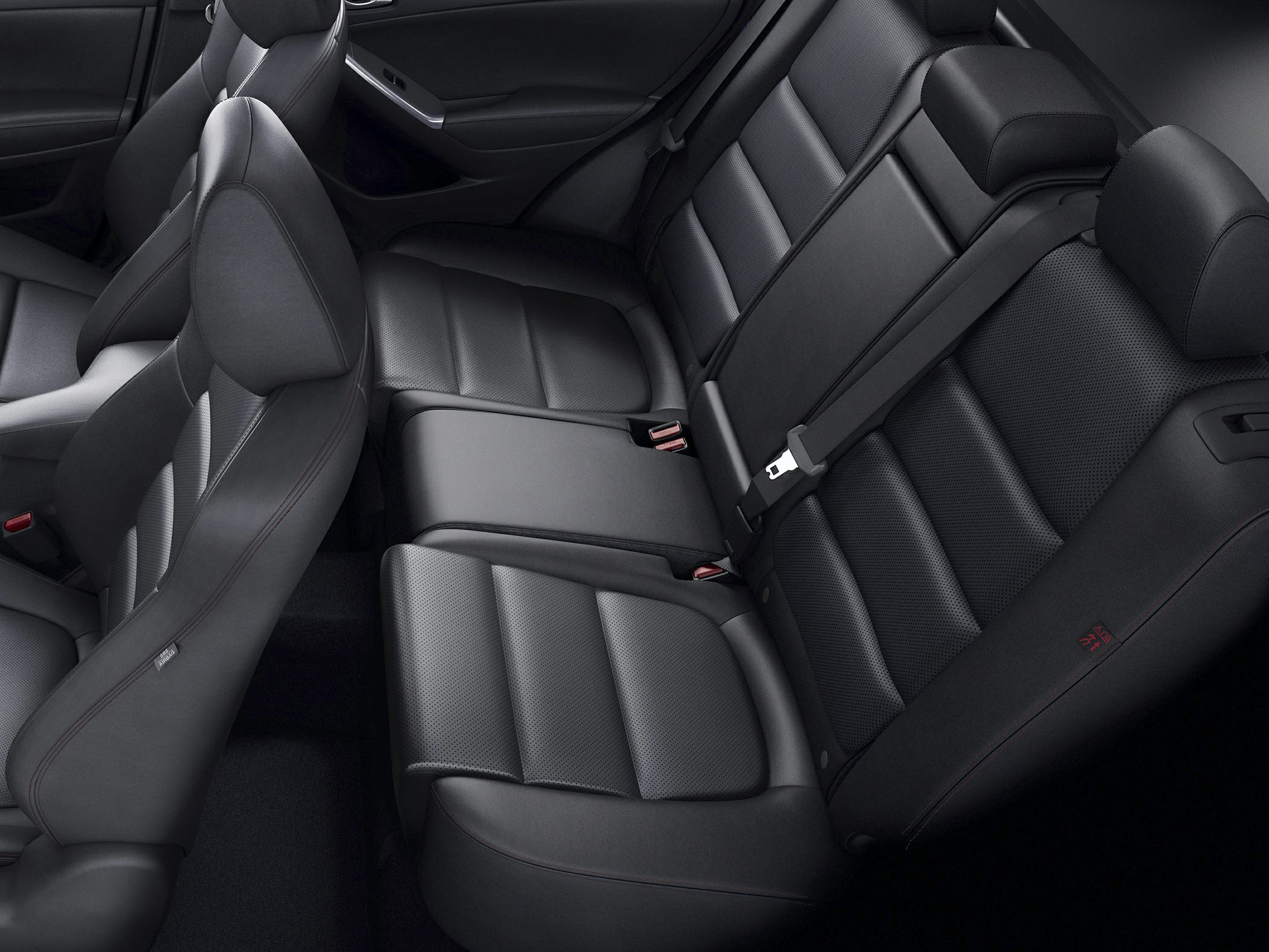 Black leather rear seats with seat belts and center armrest