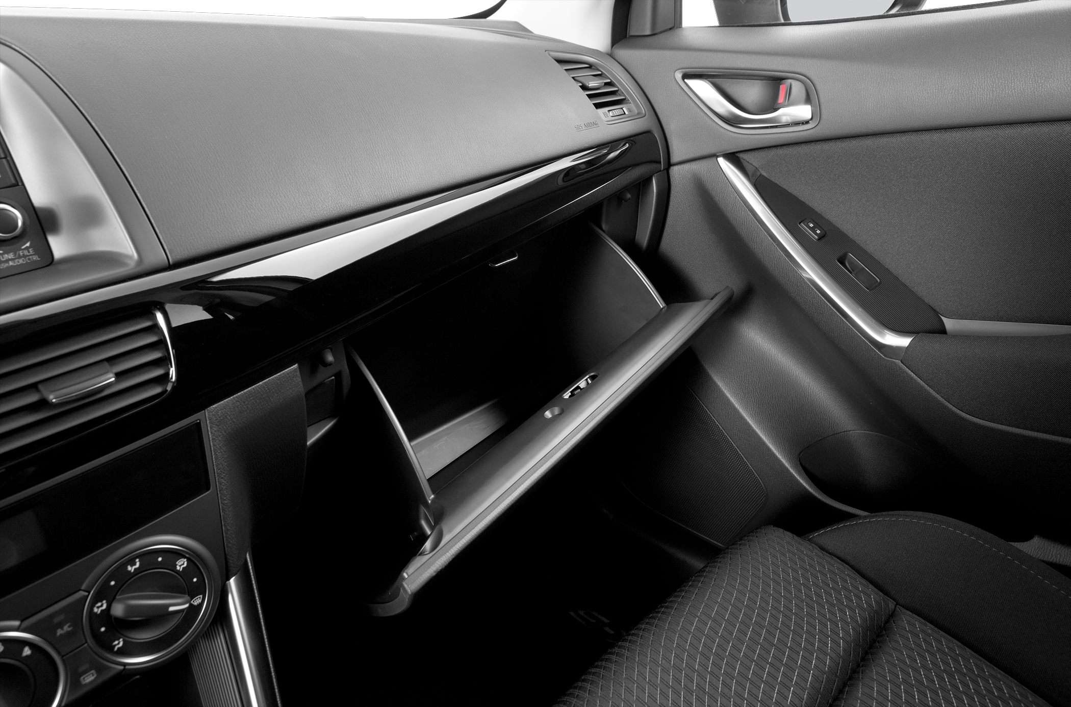 Dashboard, open glove box, passenger door panel interior view