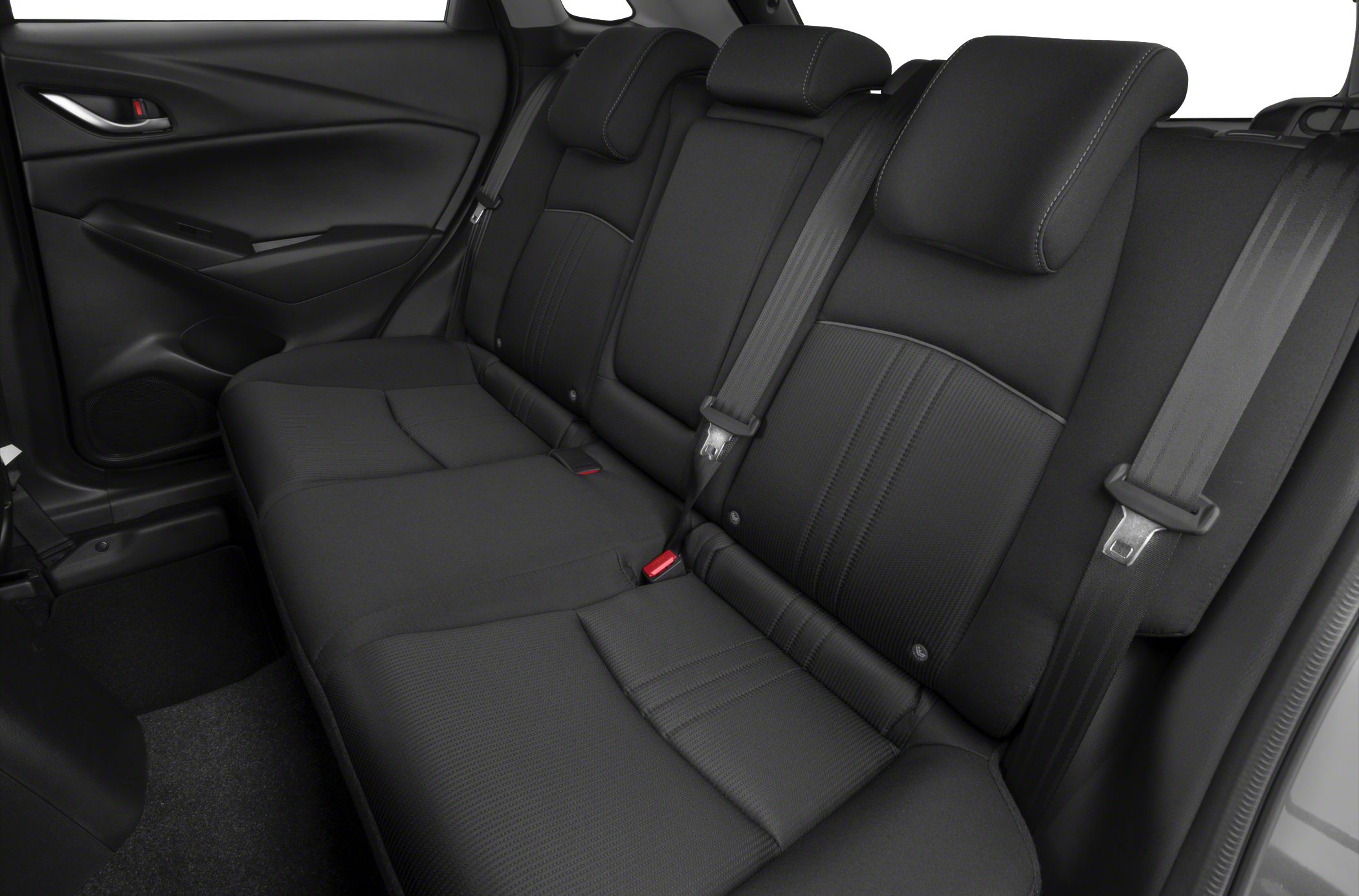 Rear passenger seat with upholstery and seatbelts