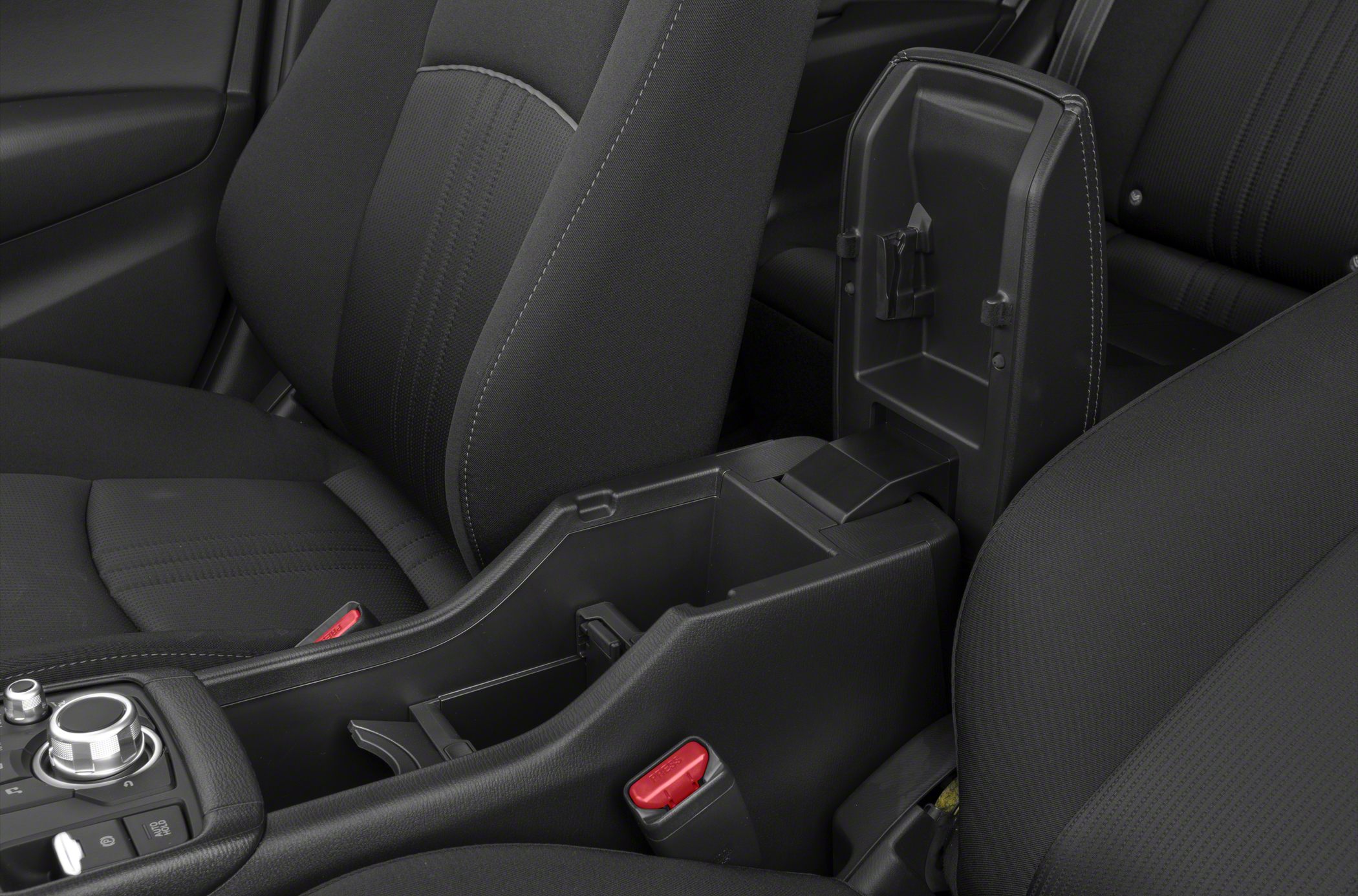 Center console storage compartment and fabric seats with stitching