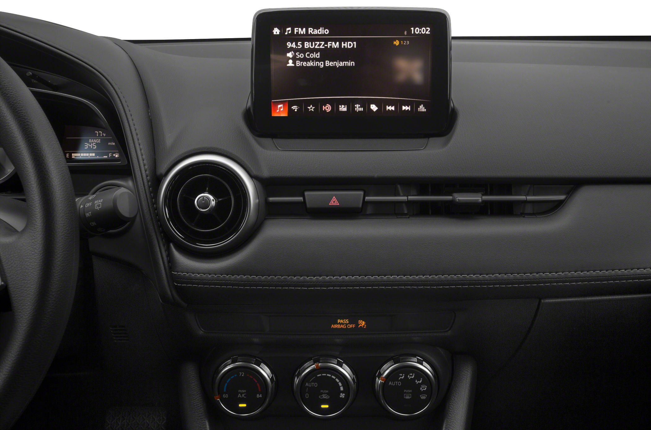Dashboard with central infotainment screen and climate control dials