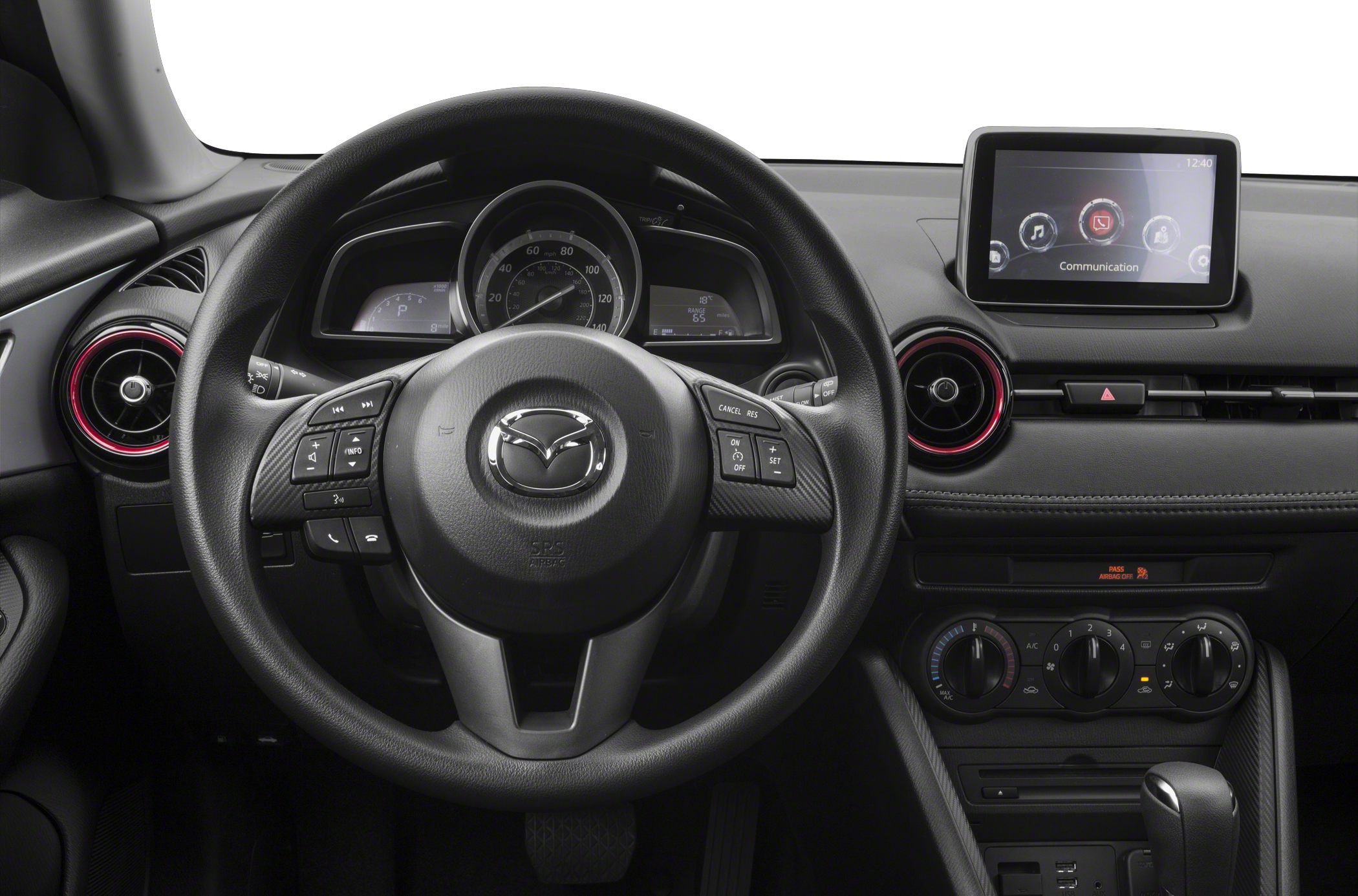 Steering wheel, dashboard, infotainment screen, climate control knobs