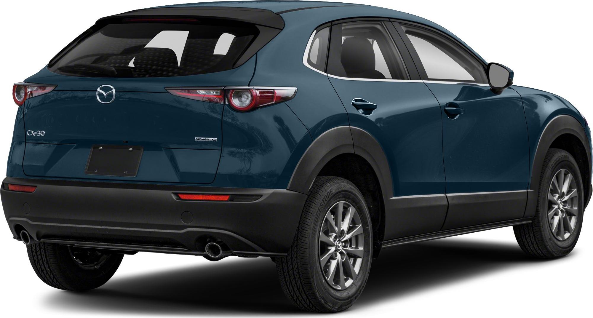 Rear side view of a compact SUV with dual exhaust and sleek taillights