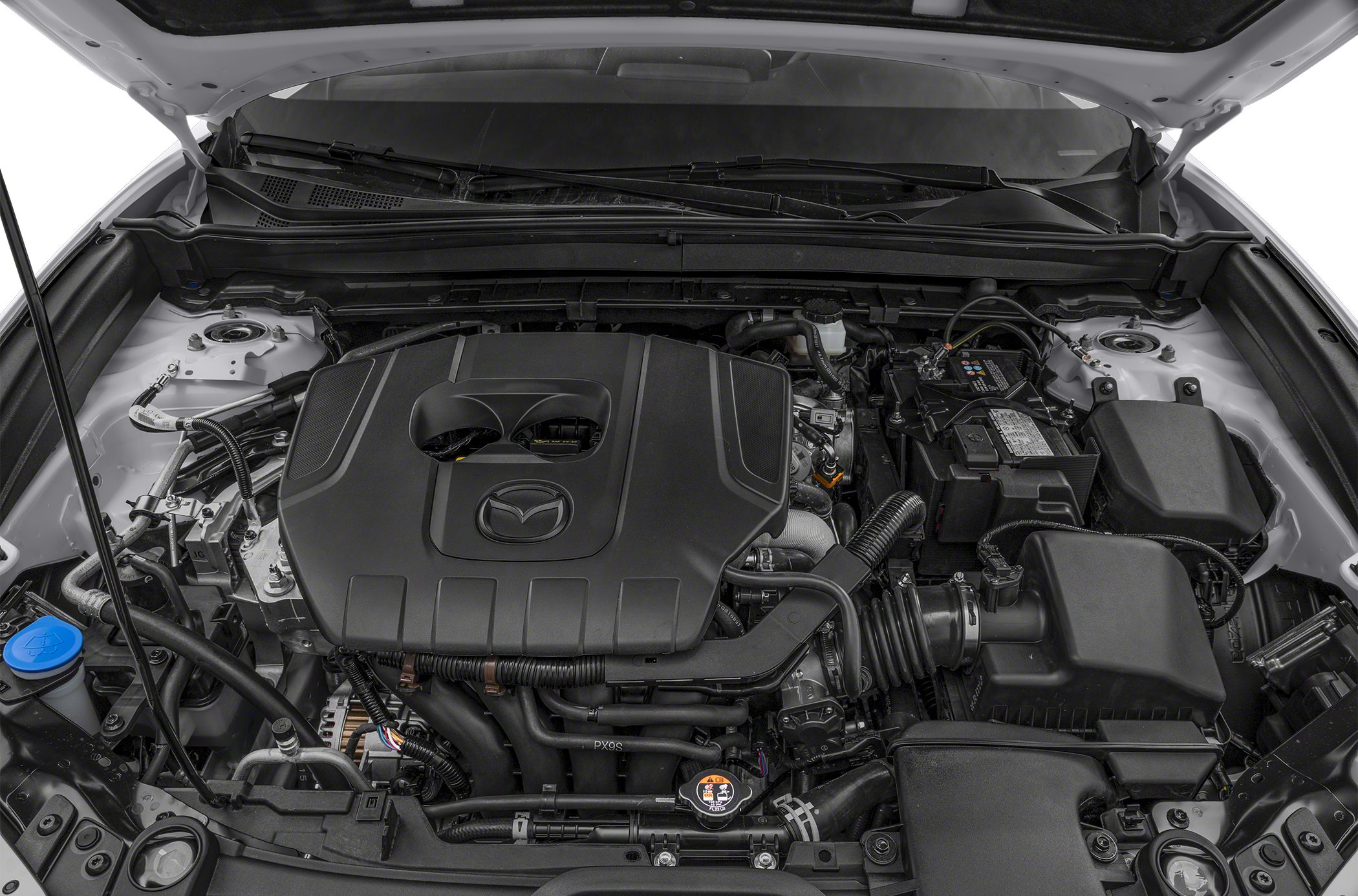 Modern engine bay with Mazda emblem engine cover and various components.