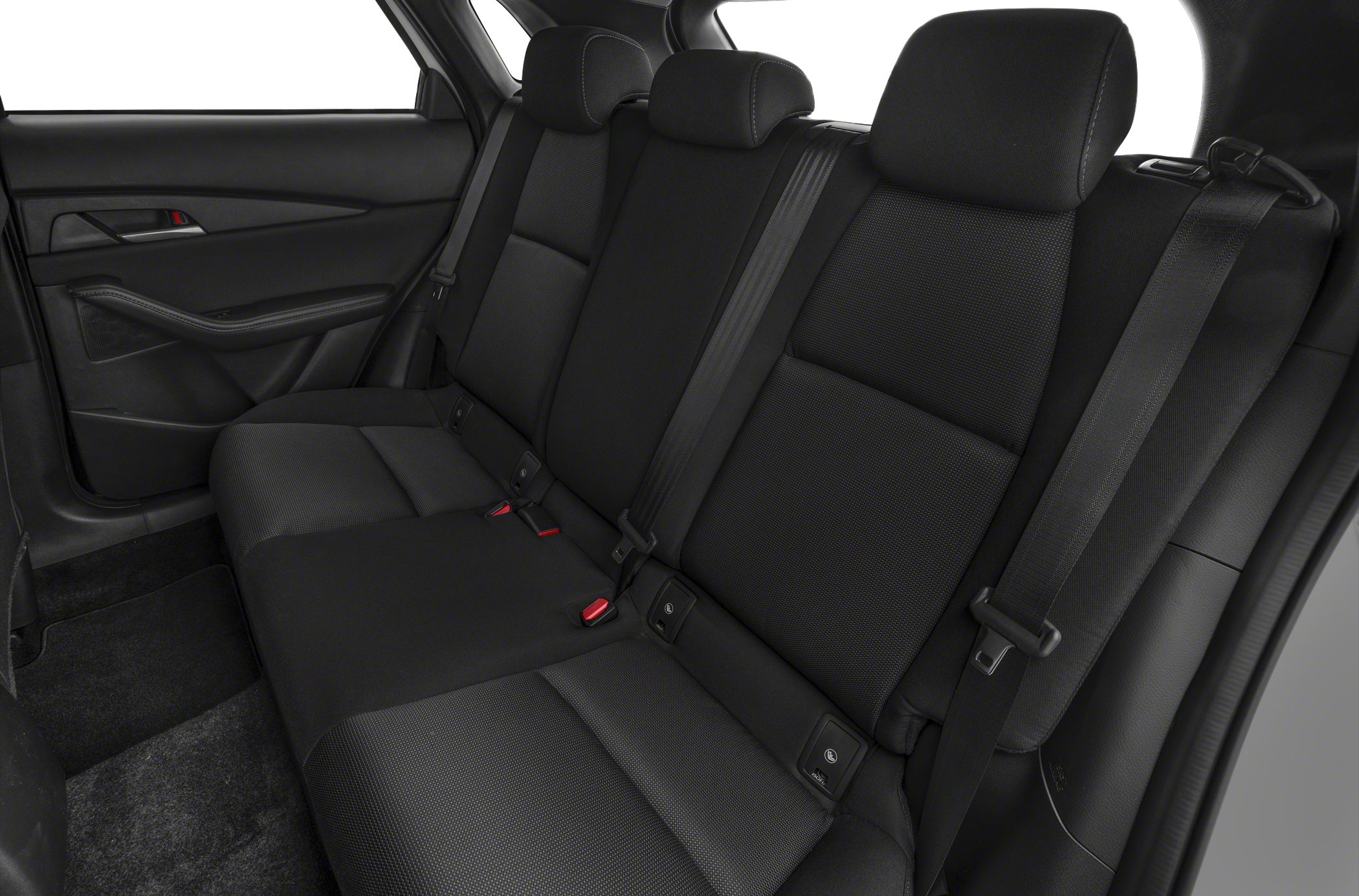Modern rear seat interior with headrests and seat belts