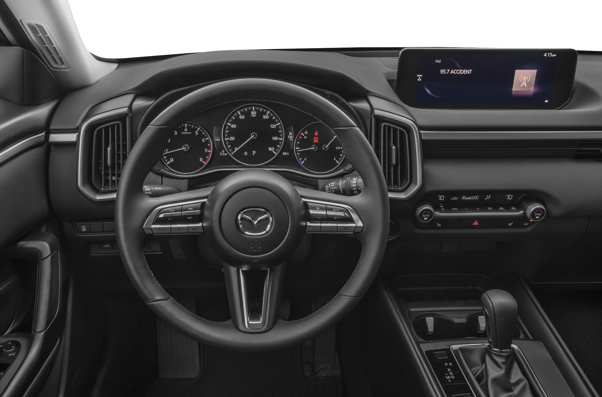Modern dashboard with analog gauges and multifunction steering wheel
