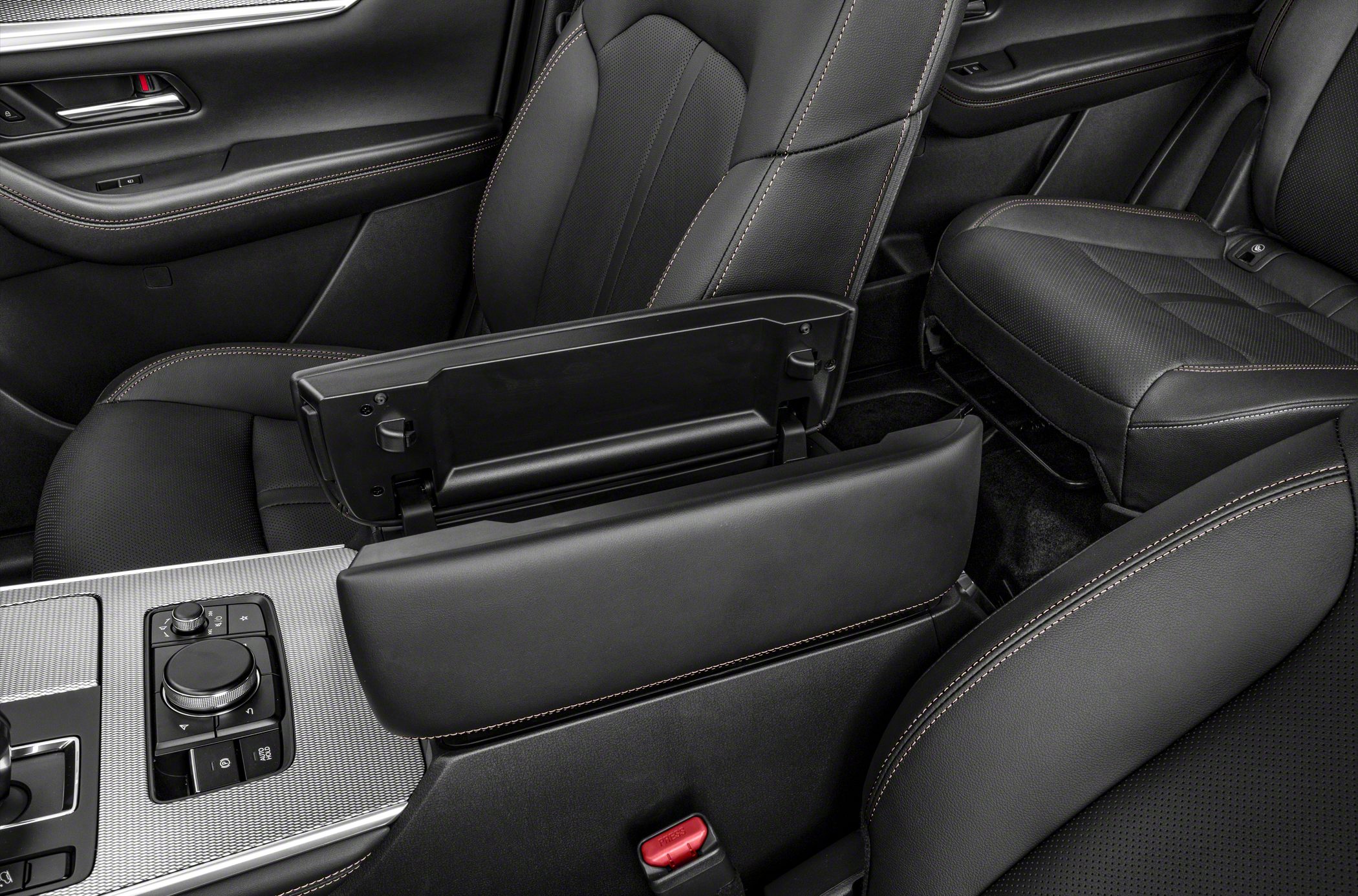 Premium center console with open storage compartment and control dial