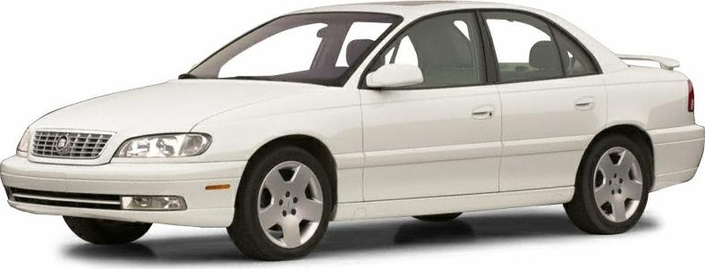 Side profile of a white luxury sedan with alloy wheels and smooth design.