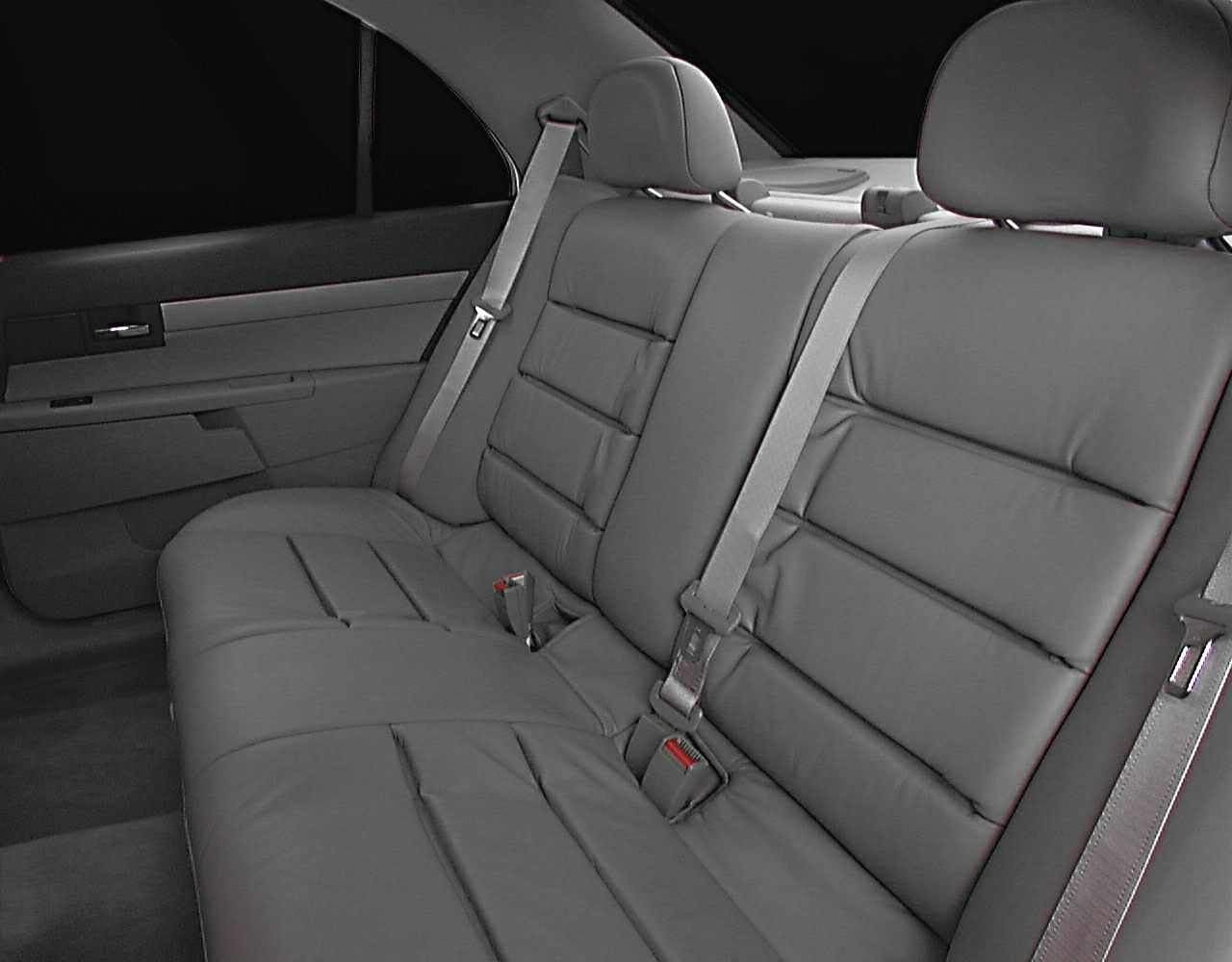Rear leather seats with seat belts and door panel