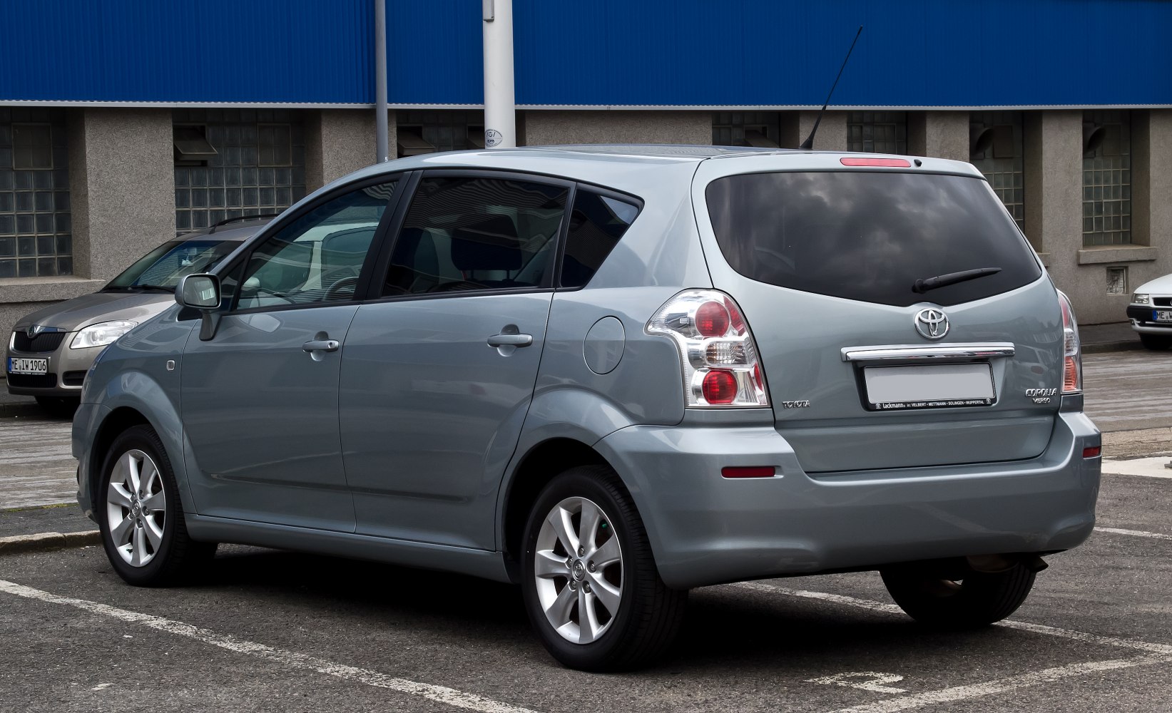 Rear side view with distinct taillights and alloy wheels