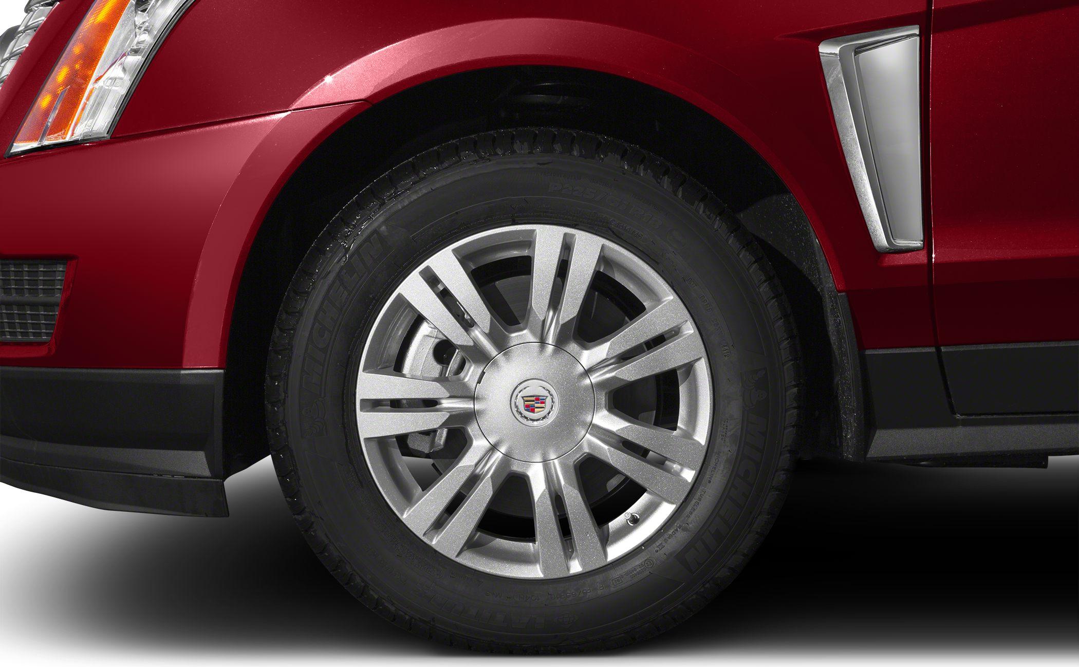 Close-up of car alloy wheel and tire tread