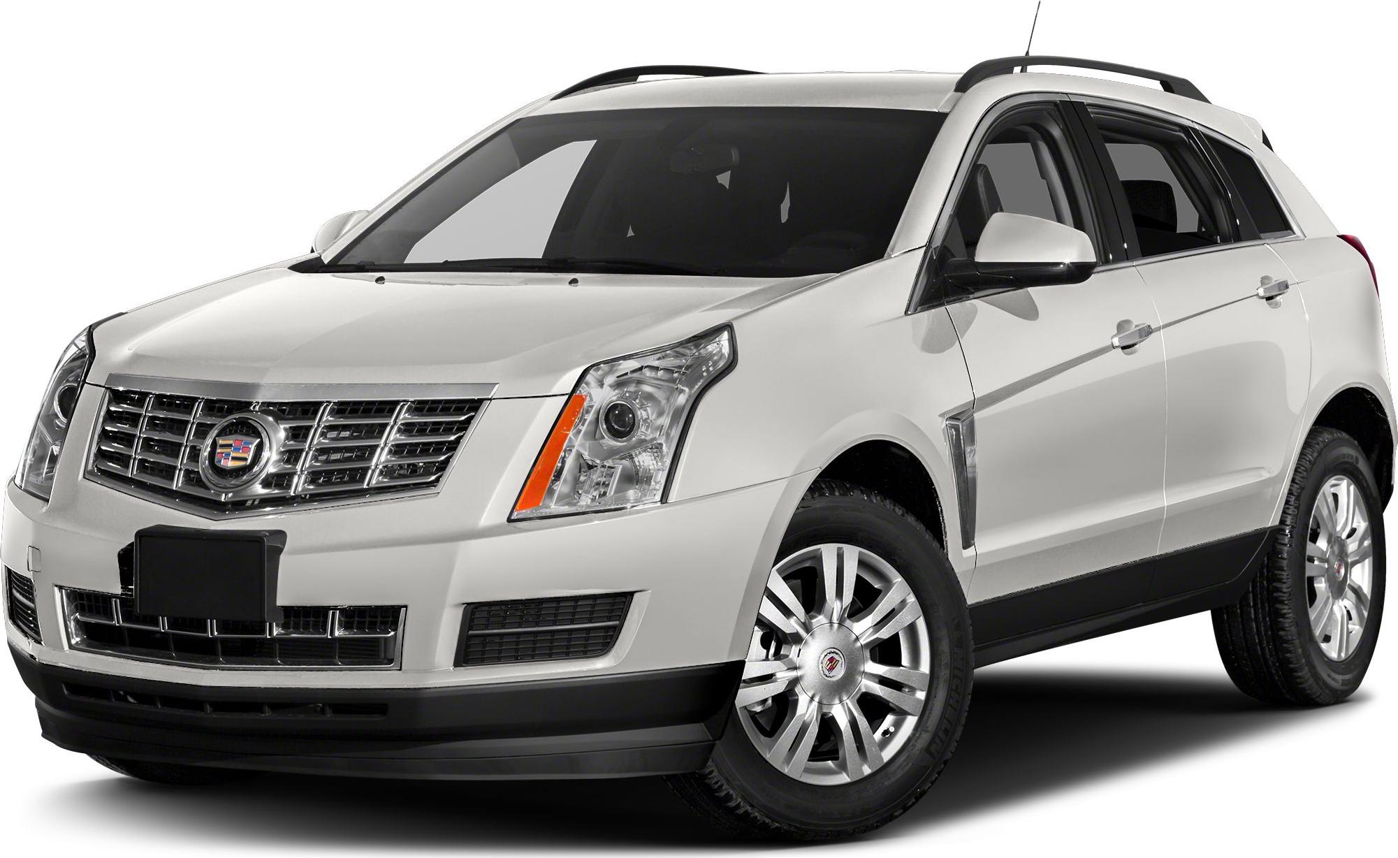 Front-side view of silver SUV with distinctive grille and headlights