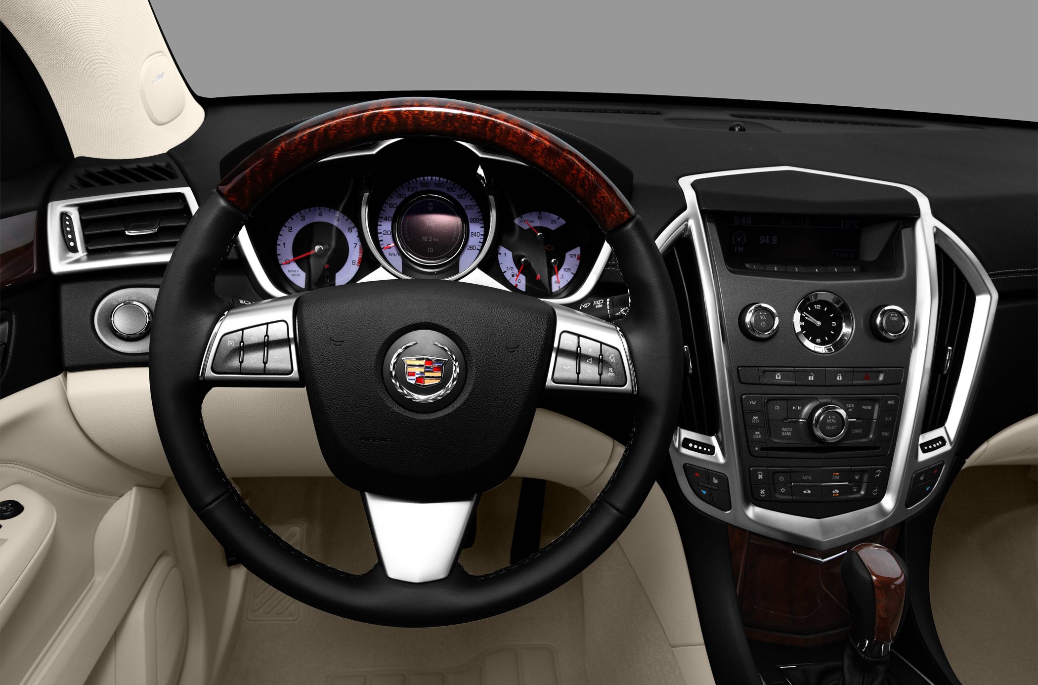 Luxury steering wheel, instrument cluster, and center console