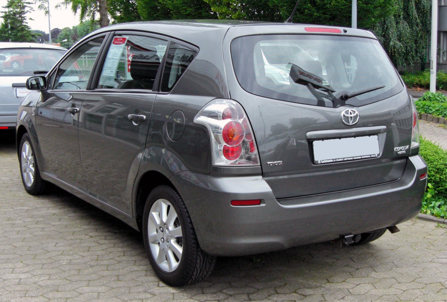 Rear view of a compact MPV with distinctive taillights and hatchback design
