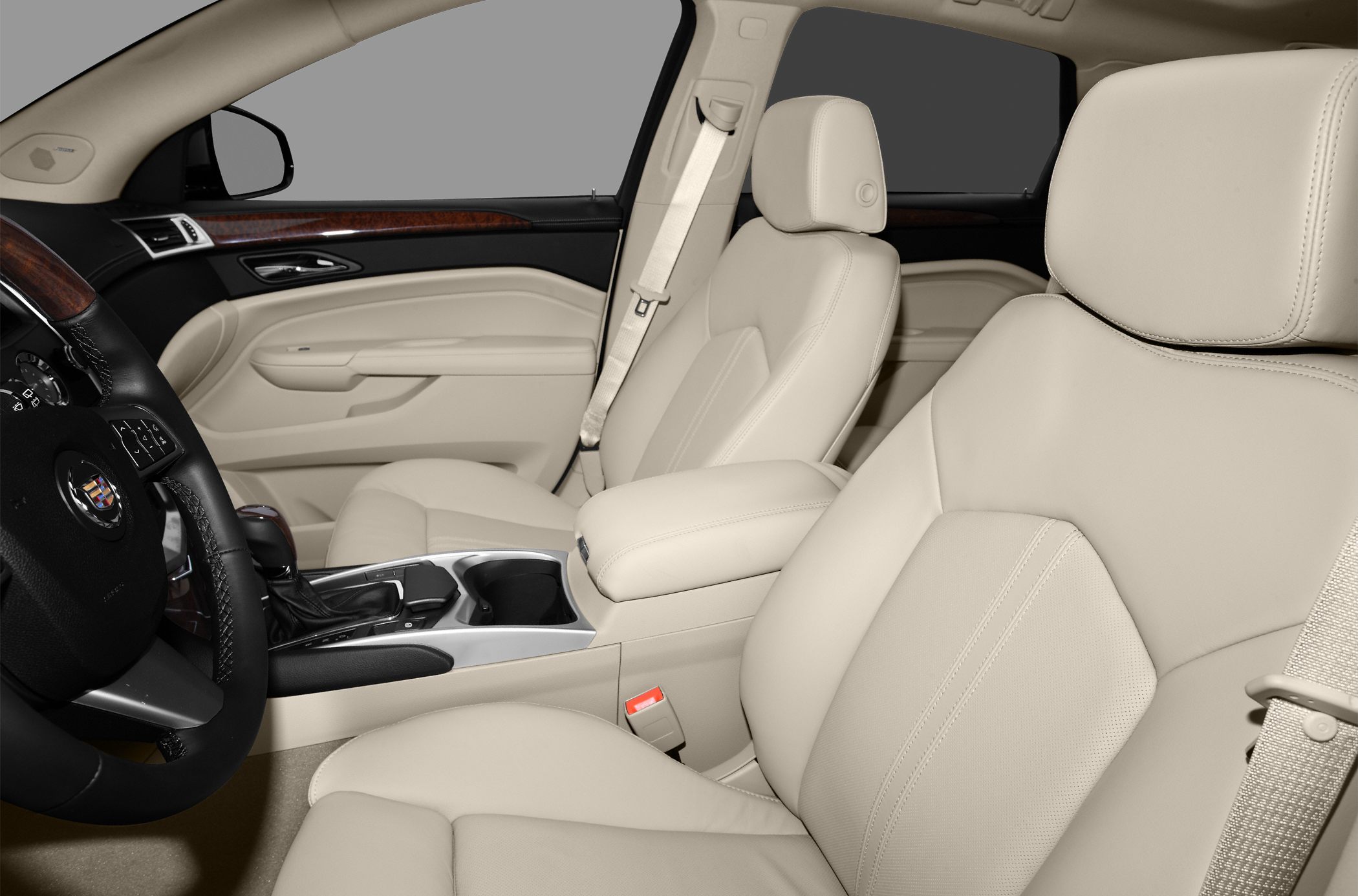 Beige leather seats with wood trim and center console details