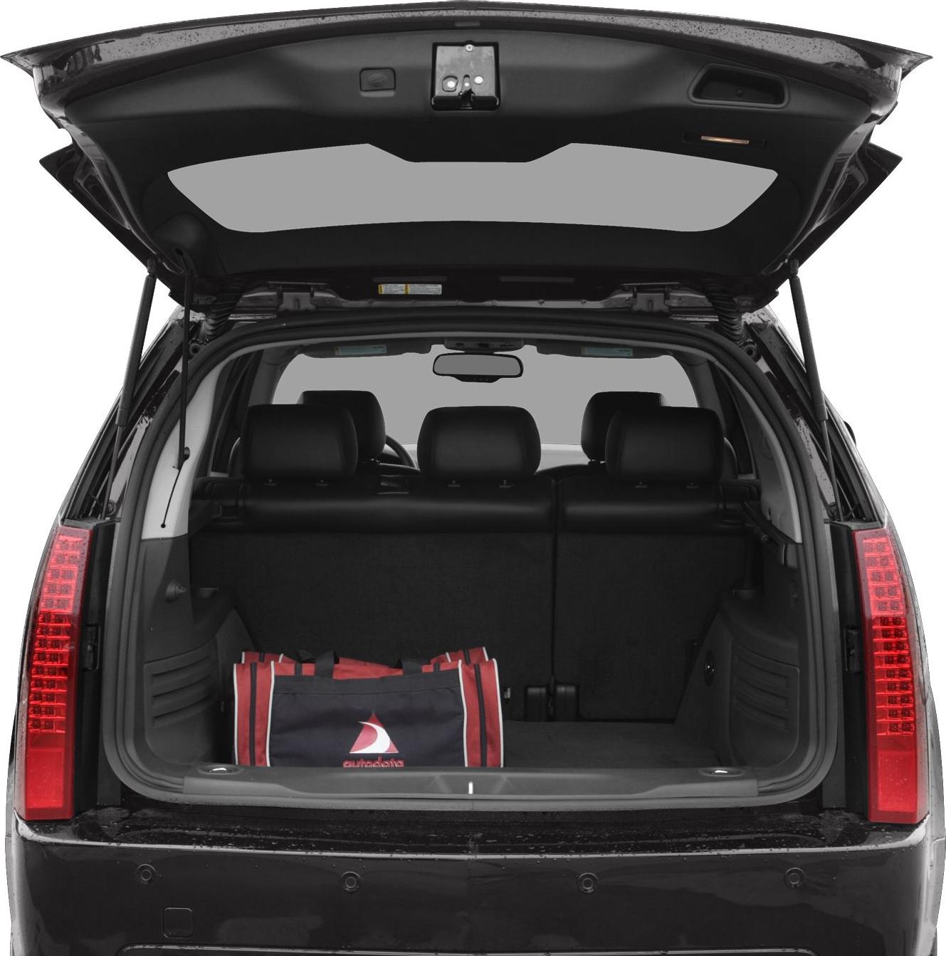 Open rear trunk with visible cargo and rear seats