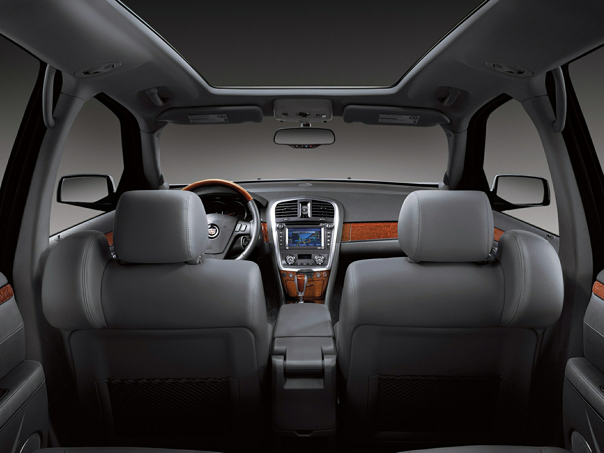 Leather seats with wood trim and panoramic sunroof interior