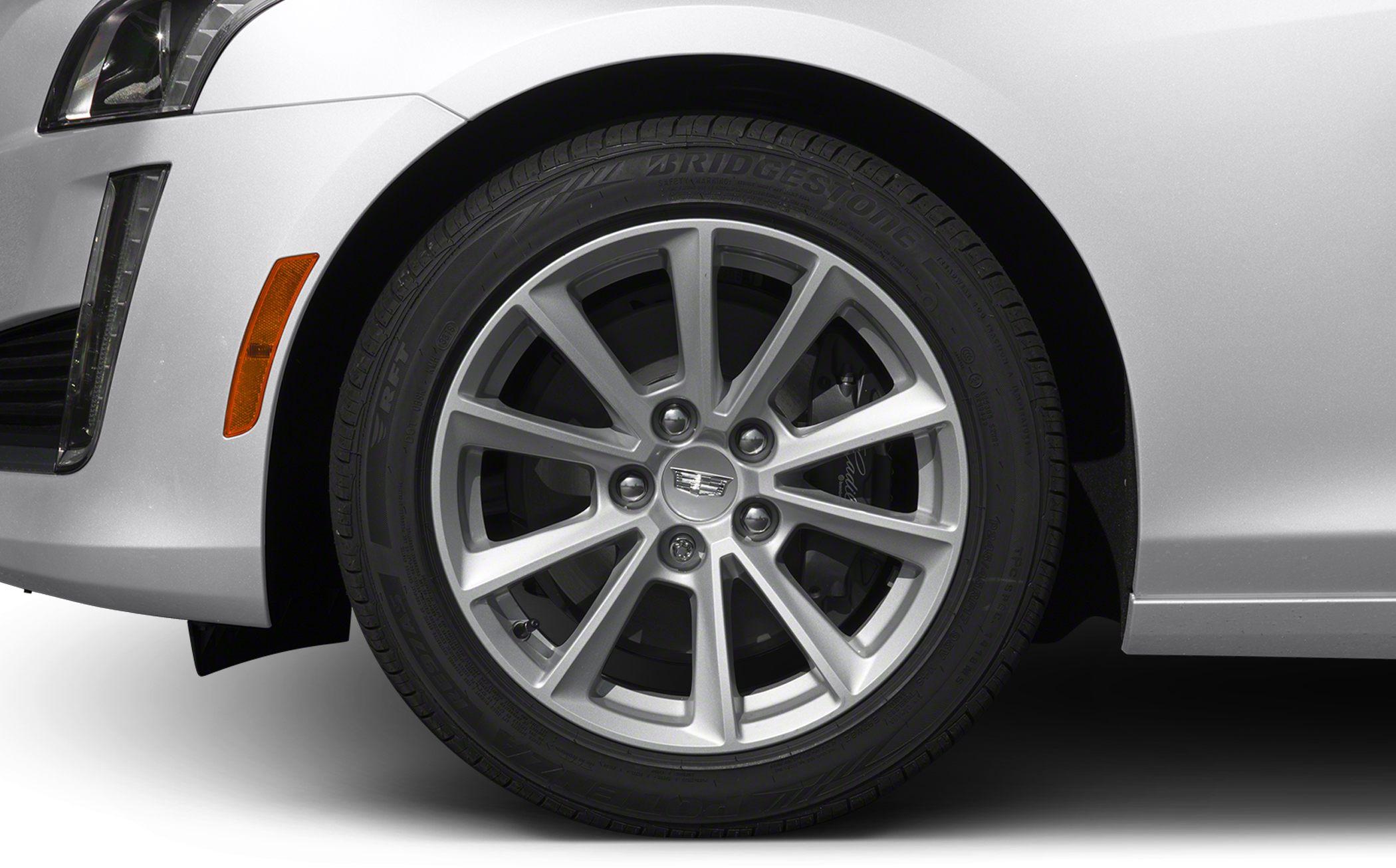 Alloy wheel, Bridgestone tire, and front fender reflector close-up
