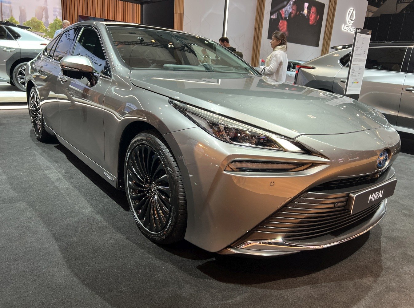 Front view with sleek headlights and black alloy wheels