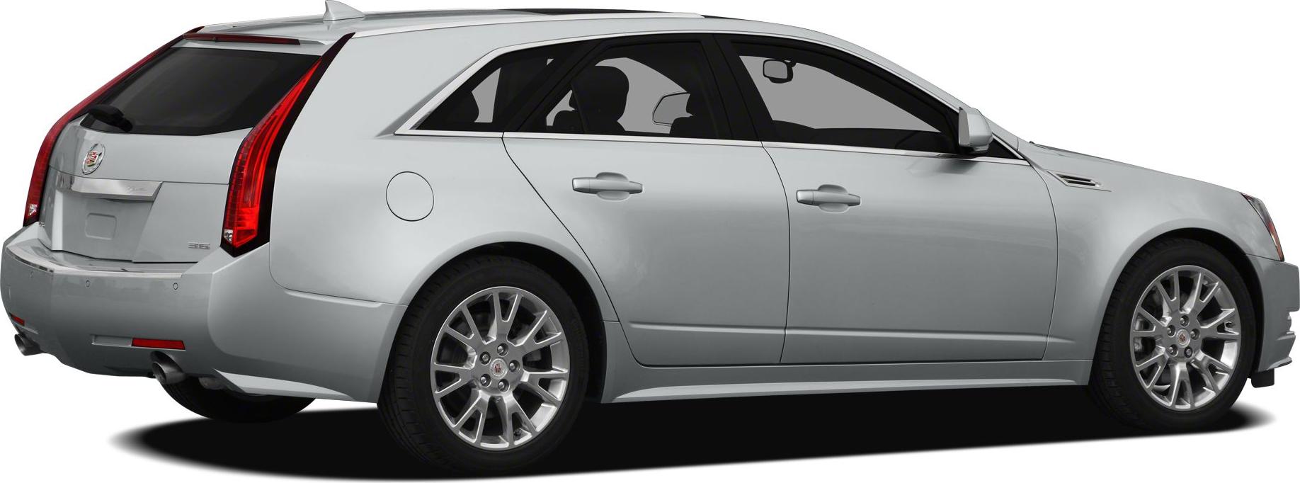 Rear-side view with vertical taillights and alloy wheels
