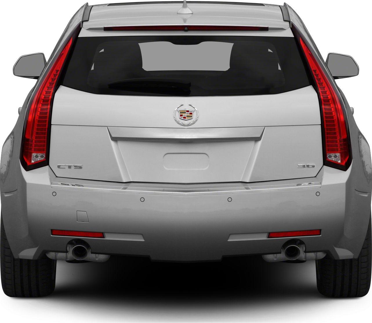 Rear view with vertical taillights and dual exhaust pipes