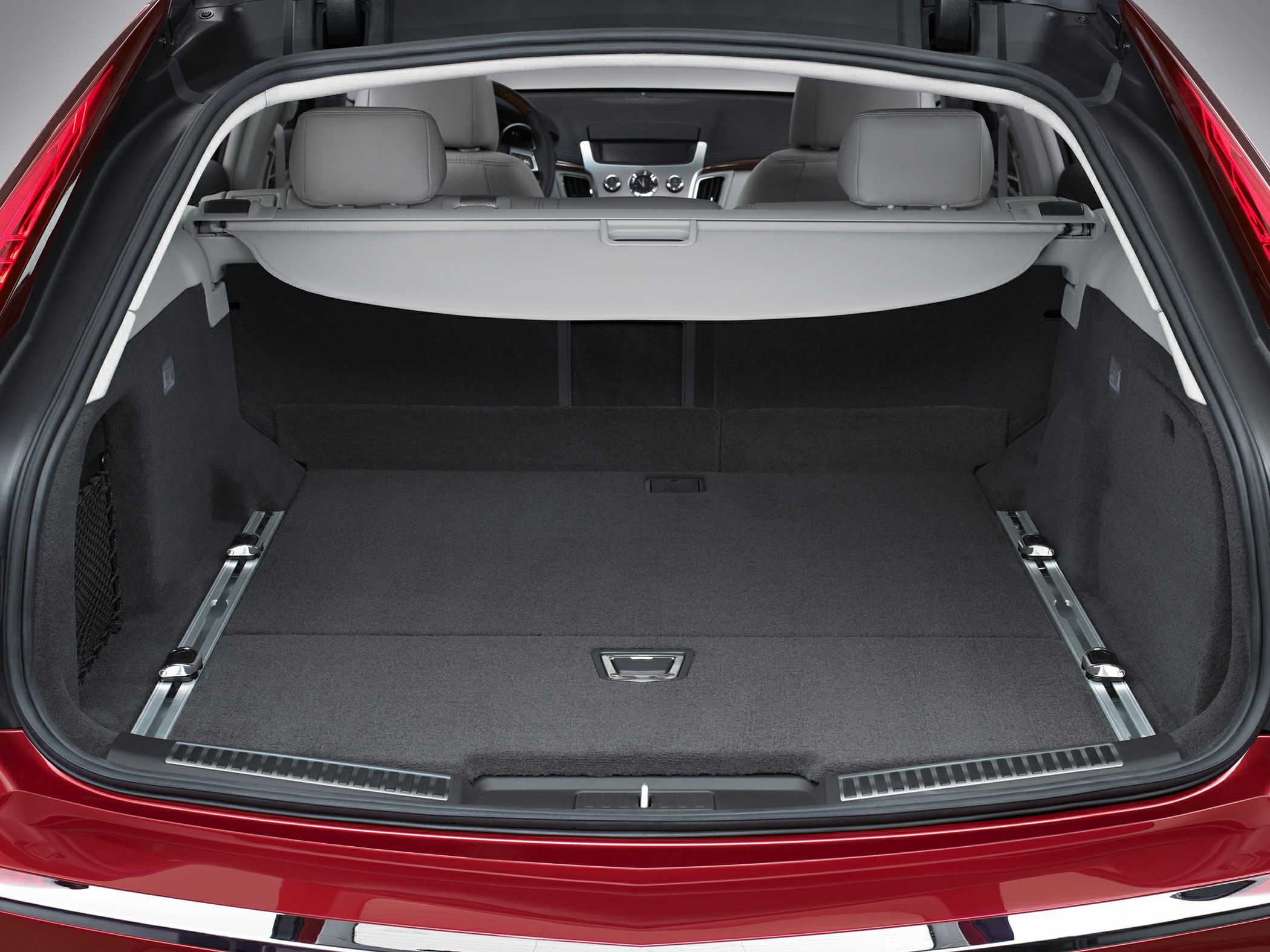 Spacious and well-organized rear cargo area with cargo cover and rails