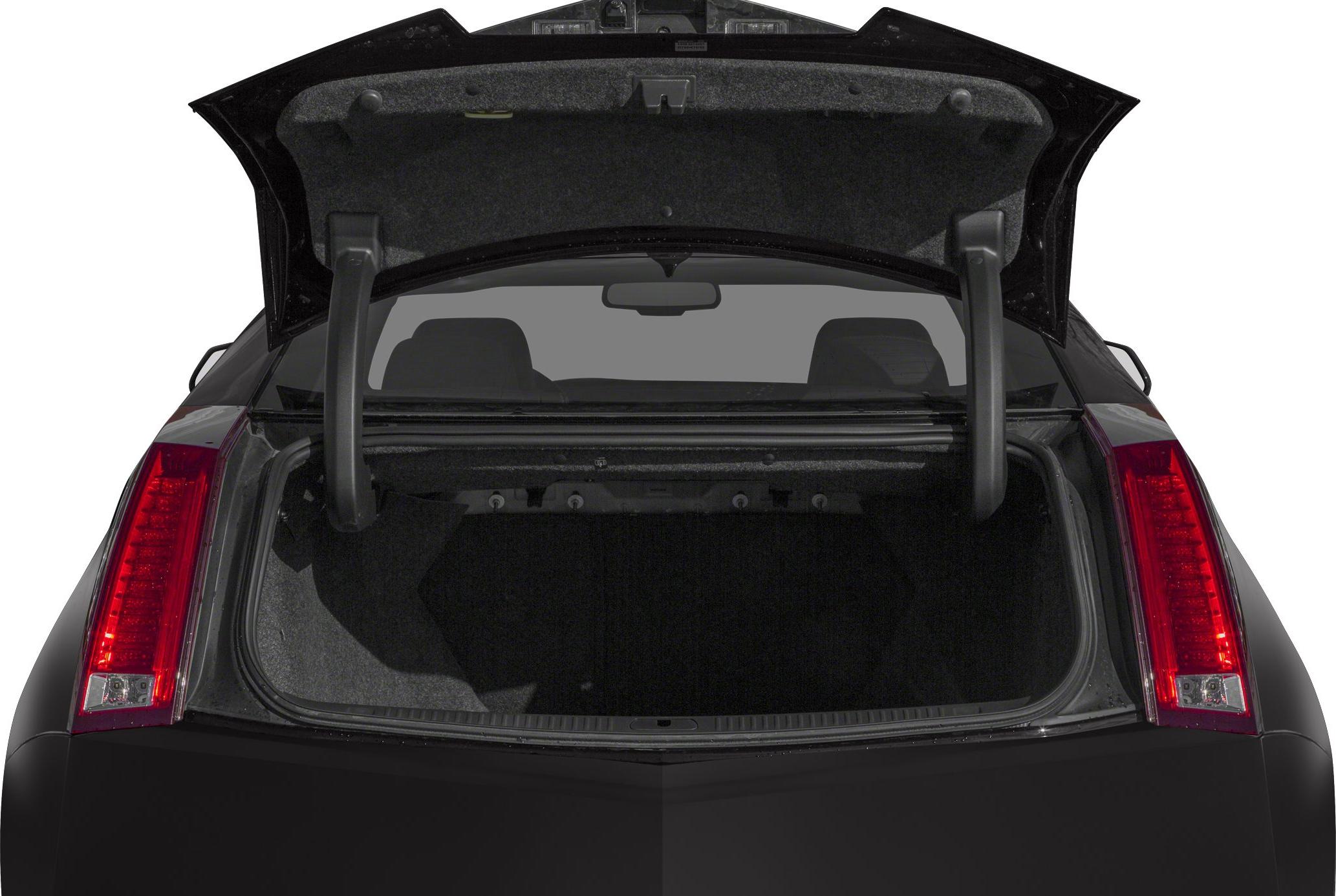 Open trunk and rear tail lights of a coupe