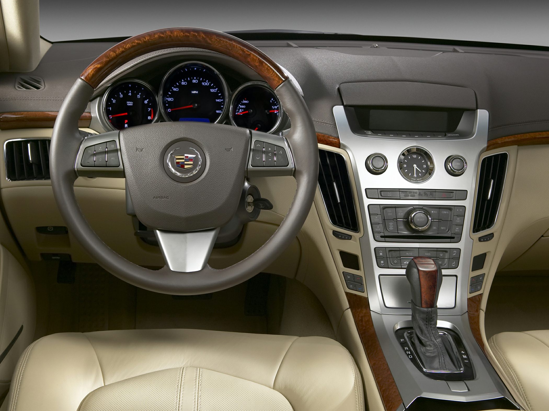 Steering wheel and dashboard with instrument cluster and center console