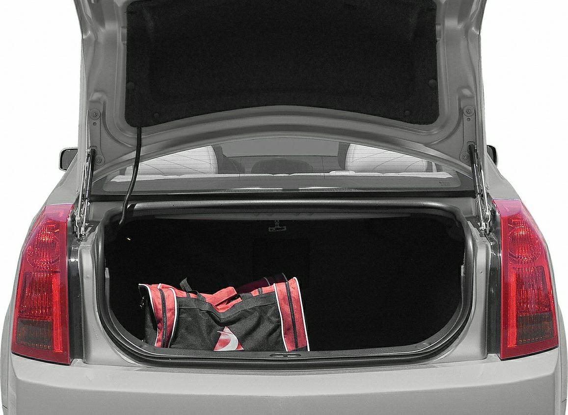 Open trunk showing ample storage space with a bag inside