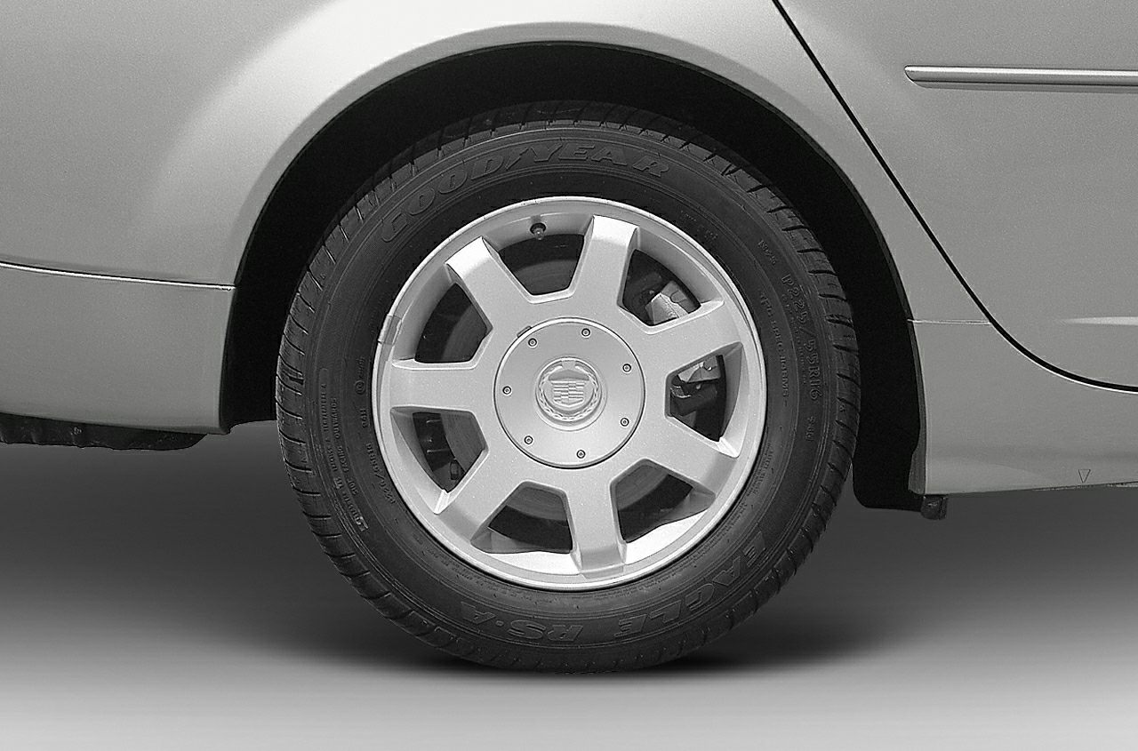 Alloy wheel with Goodyear tire on car rear side