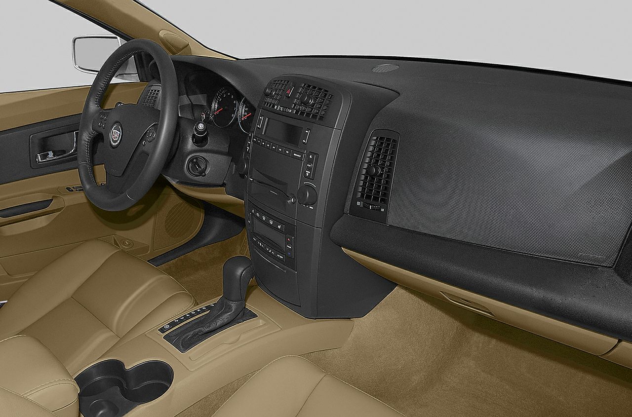 Interior dashboard and steering wheel with beige seats