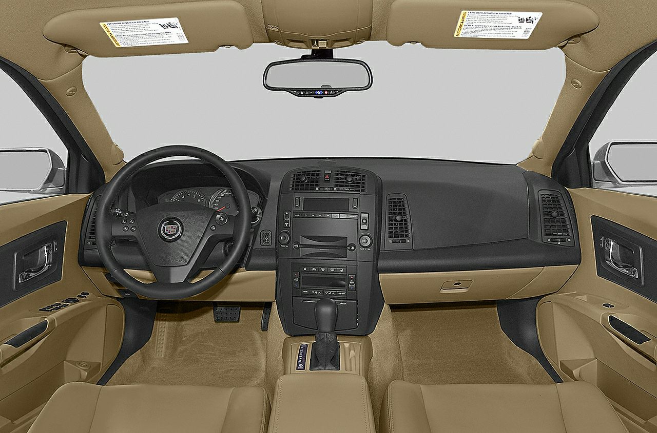 Dashboard and steering wheel with beige upholstery