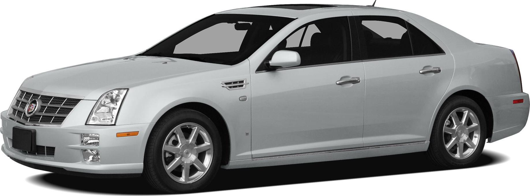 Mid-2000s four-door sedan with alloy wheels and front fender vent detail