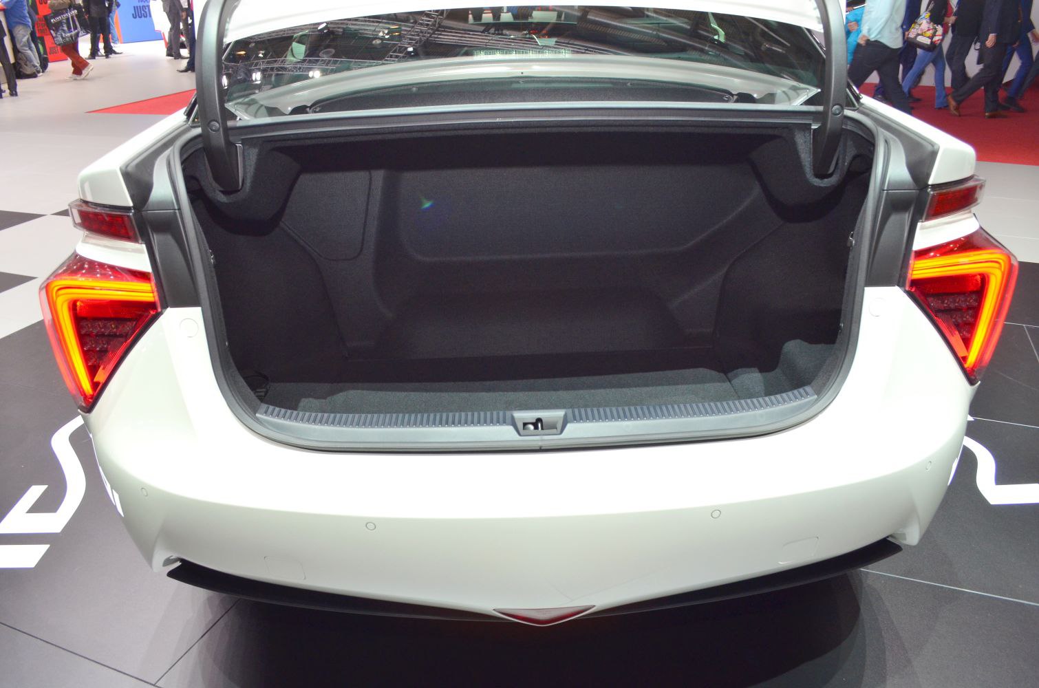 Open trunk with rear LED taillights of a modern vehicle