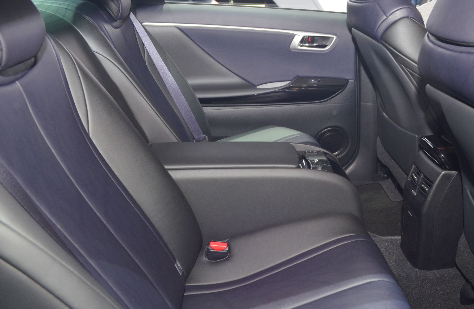 Luxury rear seat design with armrest and seatbelt